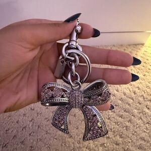 Coach bow bag charm